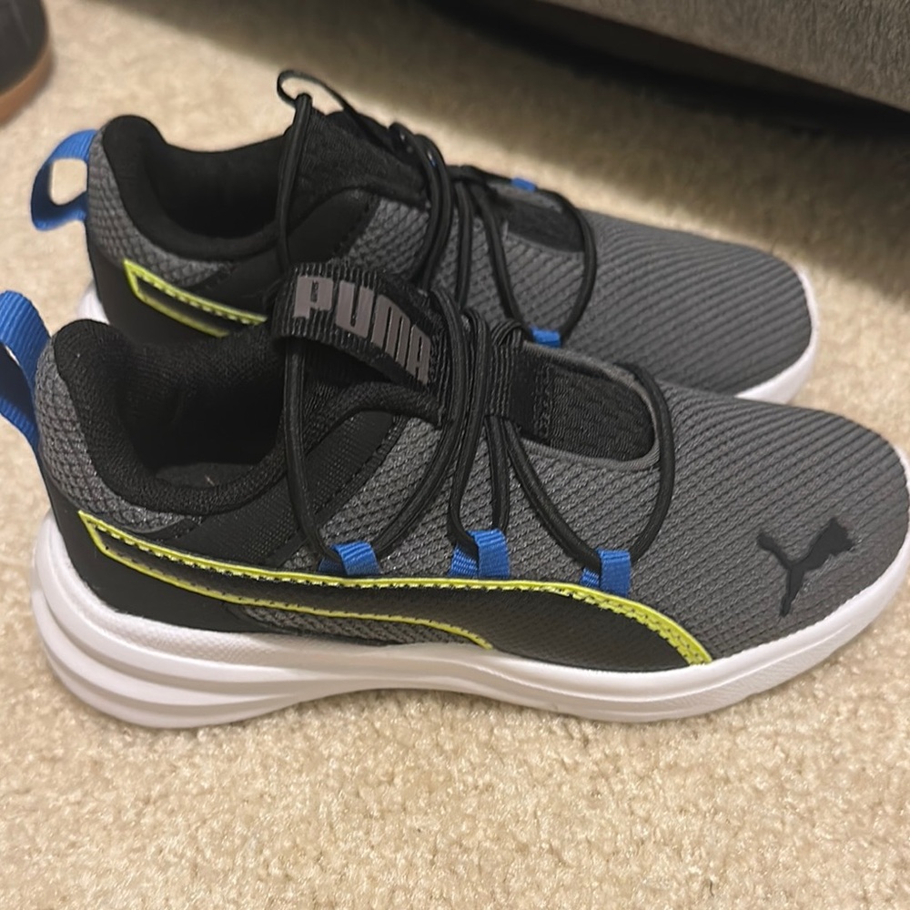 Brand new without tags size US 11 C Puma Black and Gray Sneakers